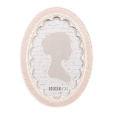 Růžový oválný fotorámeček s výřezy Yowesefew – 15x2x20 cm na fotografii 13x18 cm