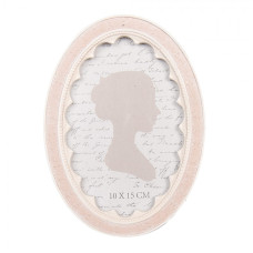 Růžový oválný fotorámeček s výřezy Yowesefew – 13x2x18 cm na fotografii 10x15 cm